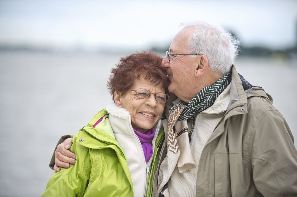 Elderly Couple with hearing issues at a lakeside